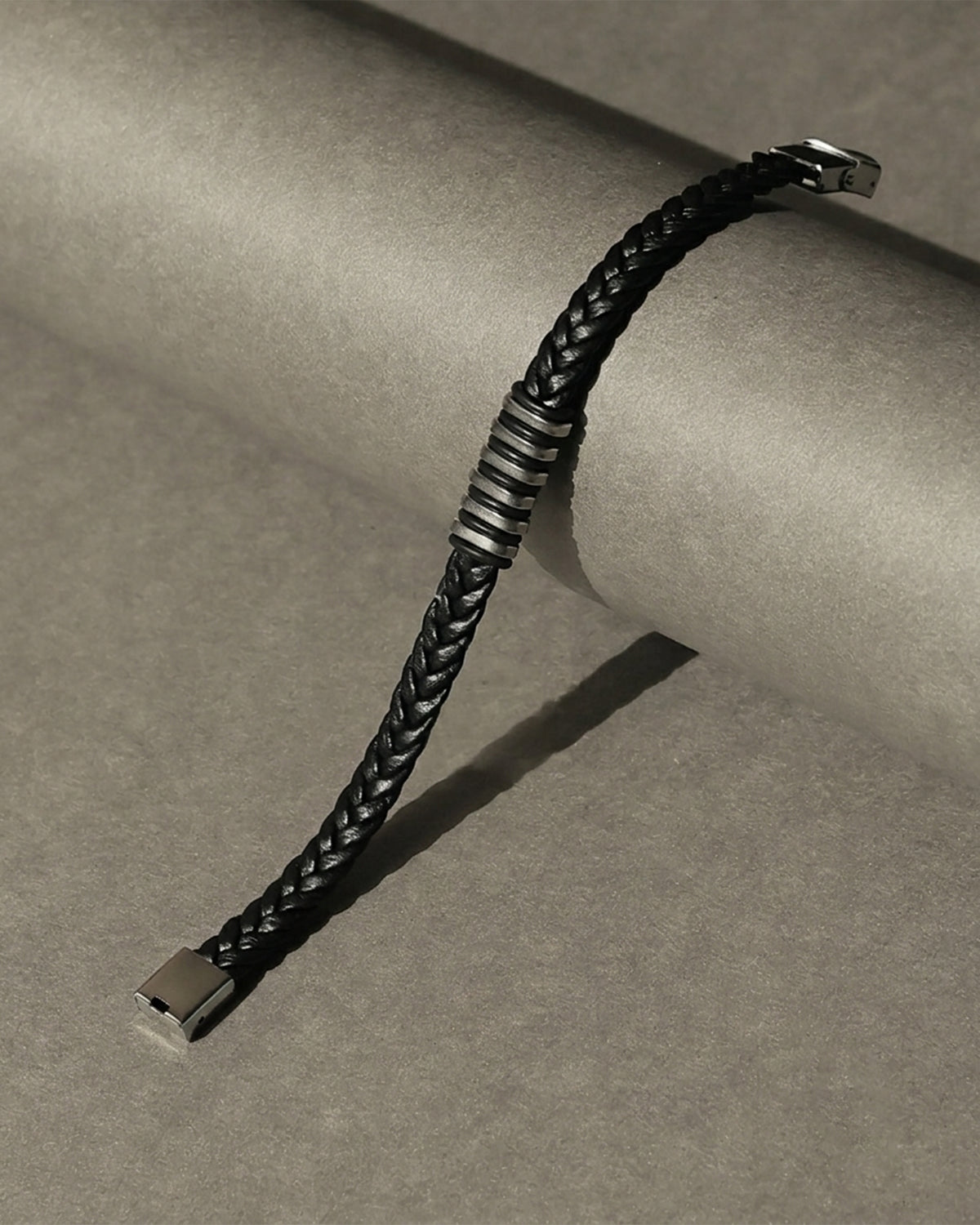 Black Braided Leather Bracelet with Silver Tone Center Detail