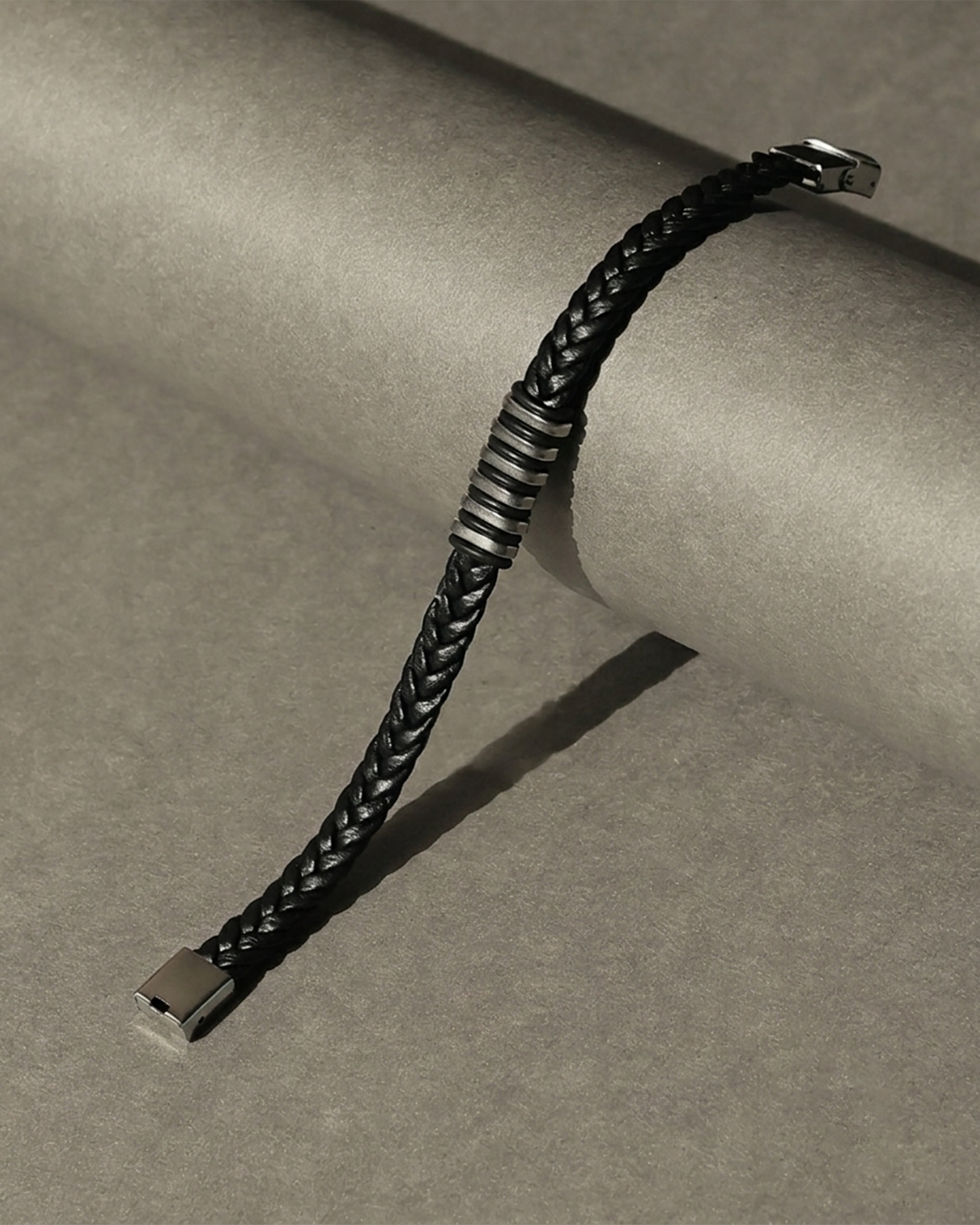 Black Braided Leather Bracelet with Silver Tone Center Detail