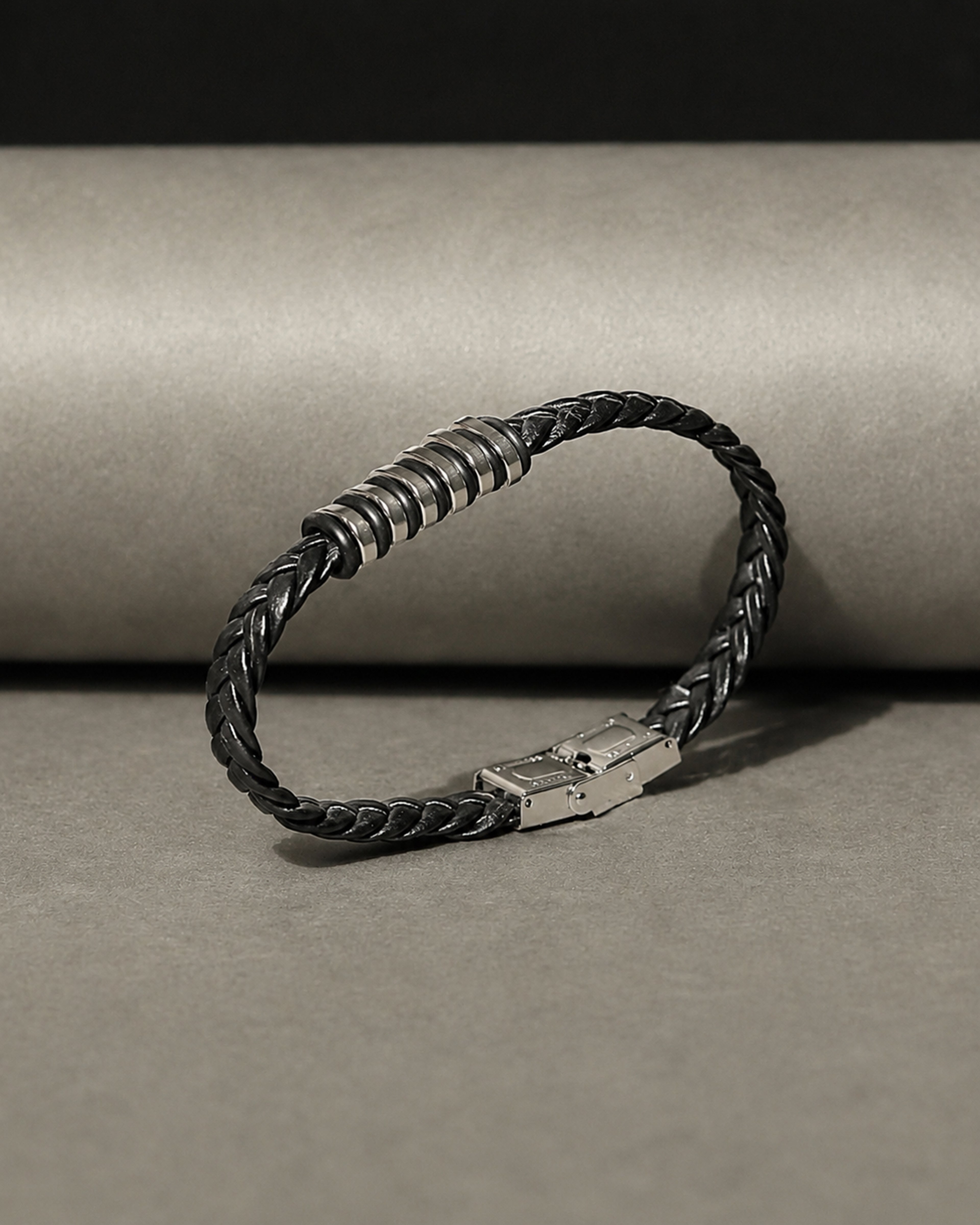 Black Braided Leather Bracelet with Silver Tone Center Detail