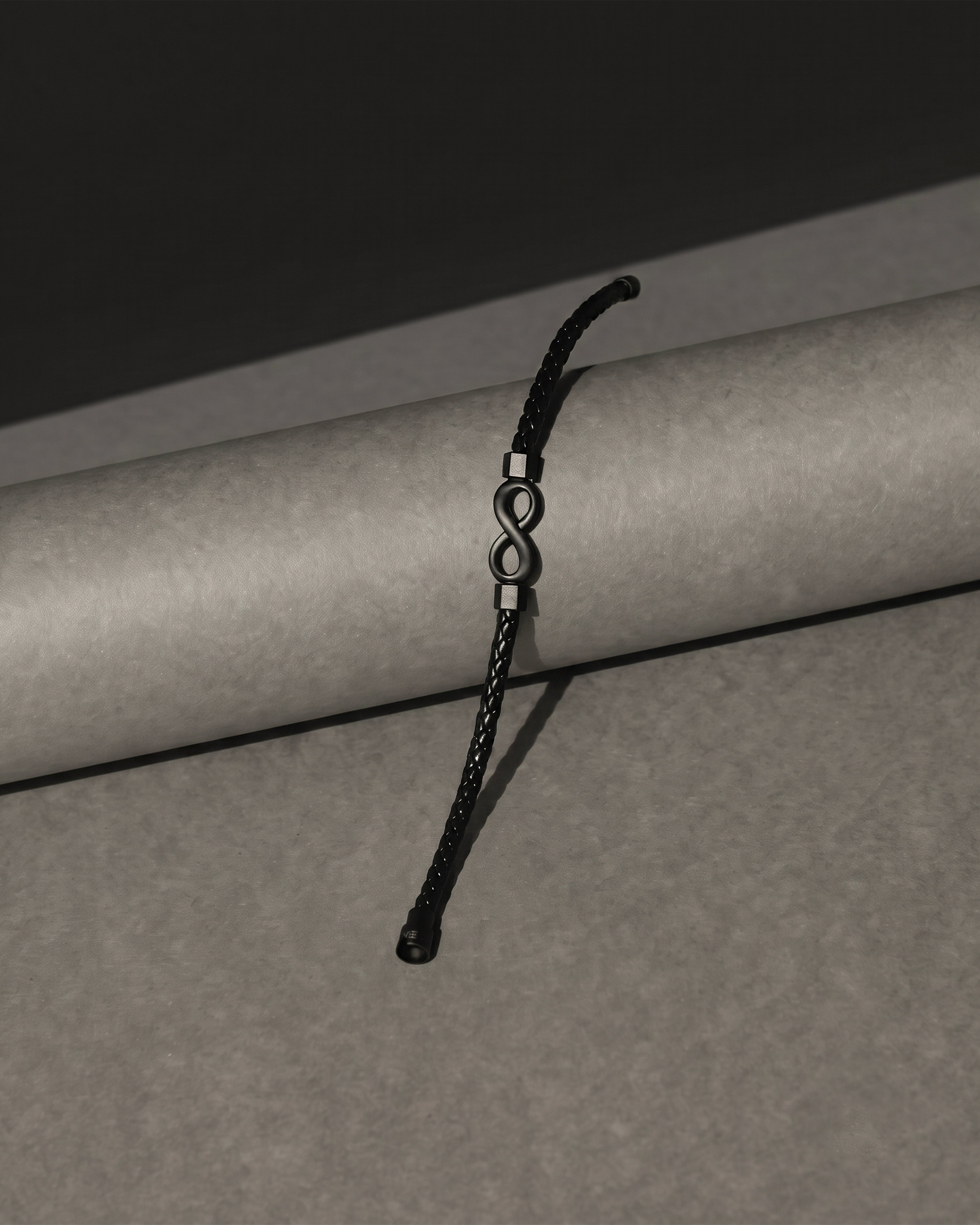 Black Braided Leather Infinity Symbol Bracelet