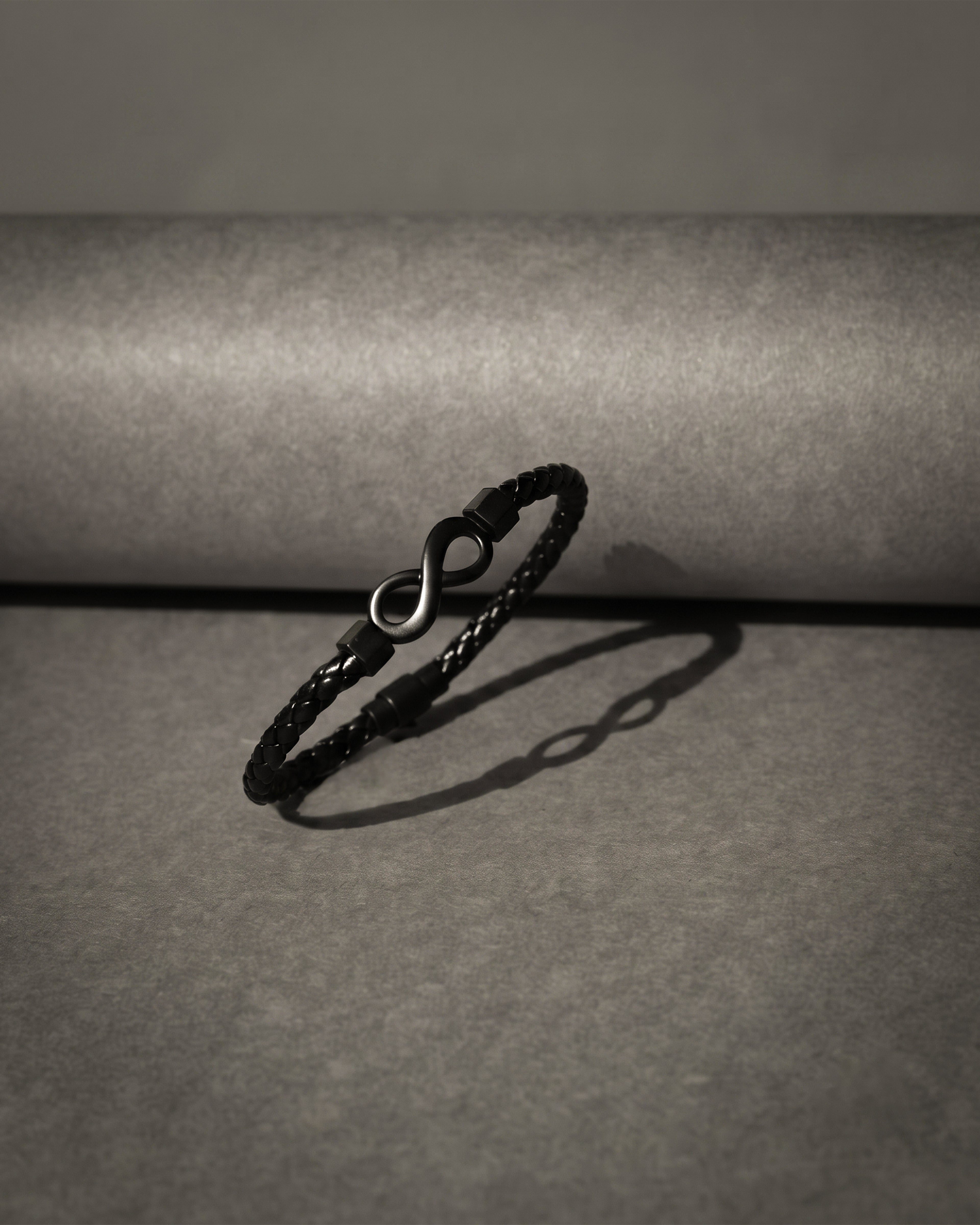 Black Braided Leather Infinity Symbol Bracelet