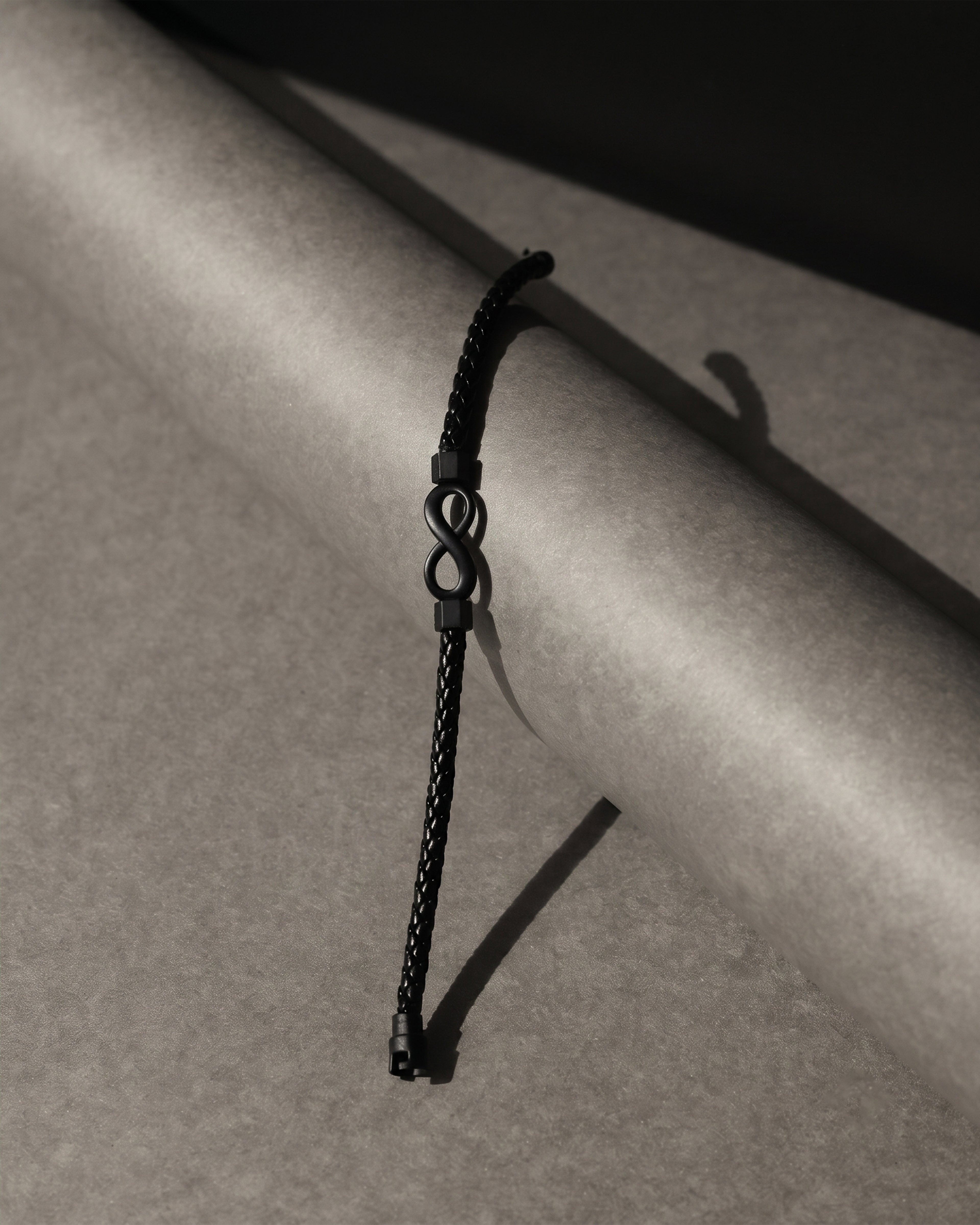Black Braided Leather Infinity Symbol Bracelet