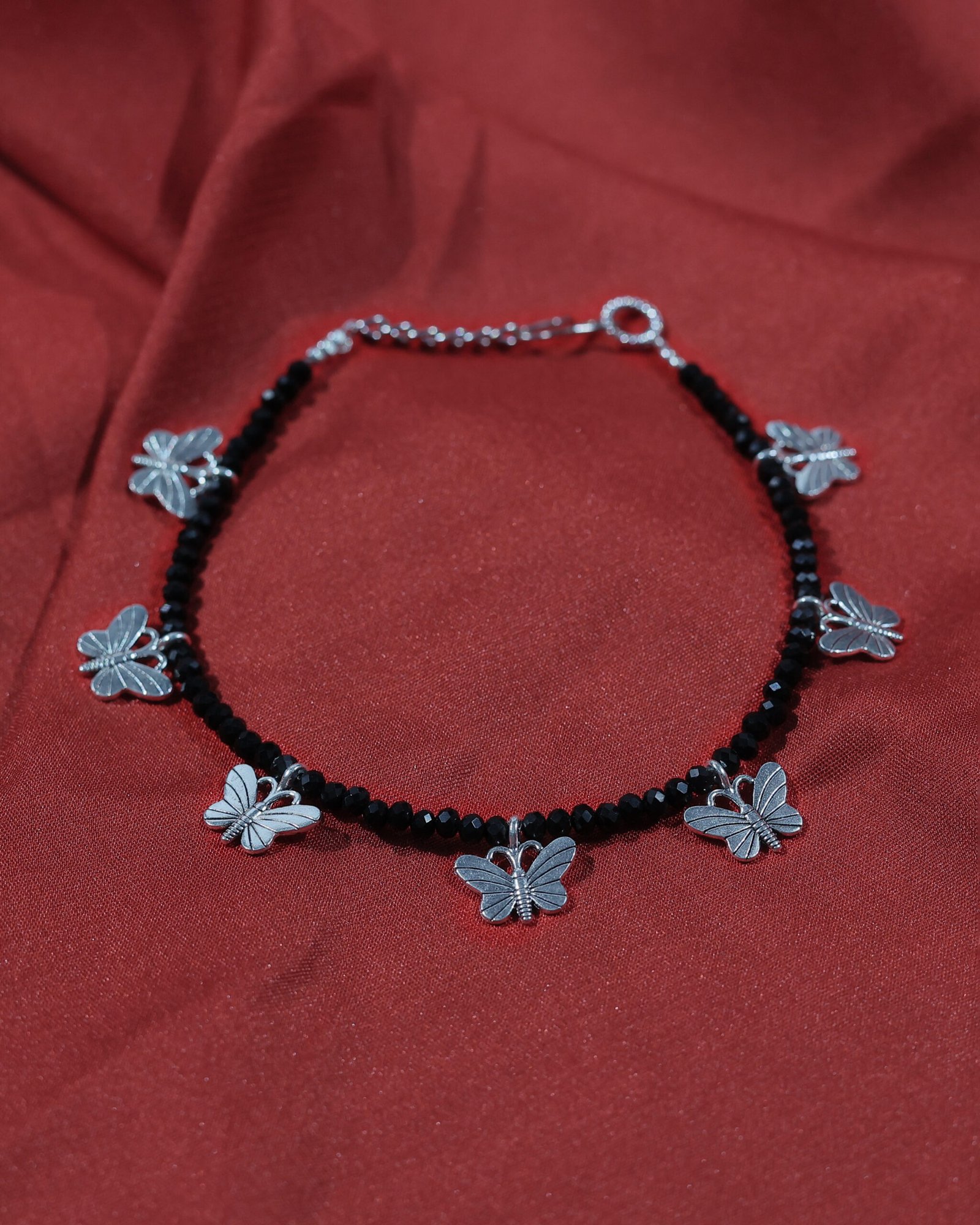 black beaded butterfly charm anklet black beaded butterfly charm anklet